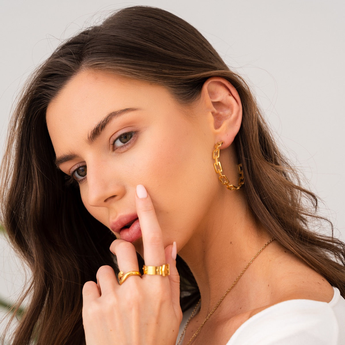 Brincos Geométricos em Ouro 18K - Cor Dourada