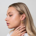 Brincos de Argola Ziyah Twist em Ouro